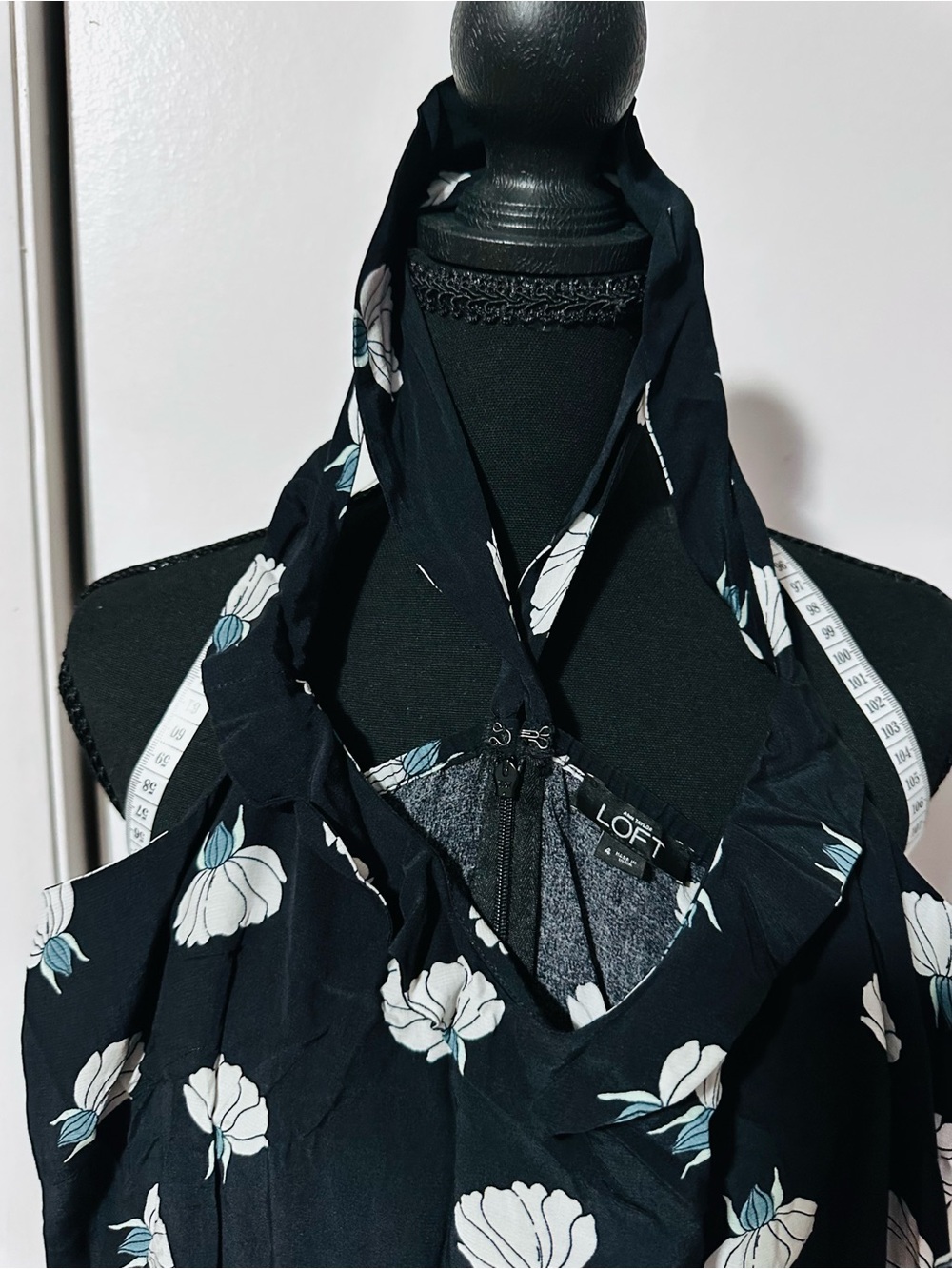 LOFT Black jumpsuit with White and Light Blue Floral Motif
